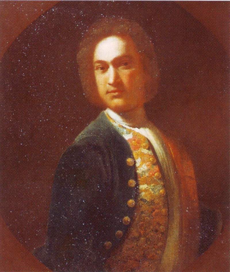 Portrait of young man in a green coat — Иван Никитин