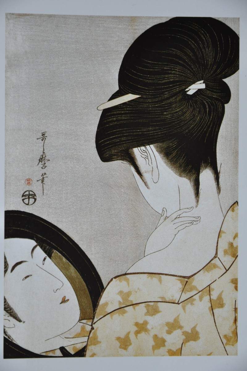 Young woman applying make up — Китагава Утамаро